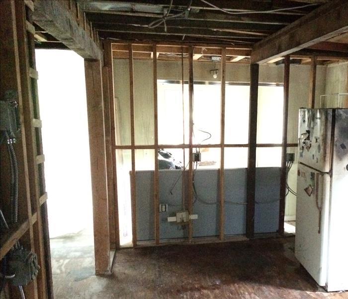 Image shows all badly burnt structure removed in the kitchen area